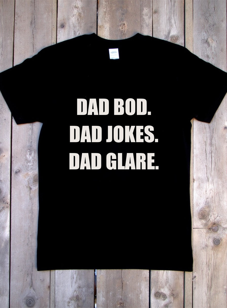 Dad Bod Dad Jokes Dad Glare Shirt — flat lay photo