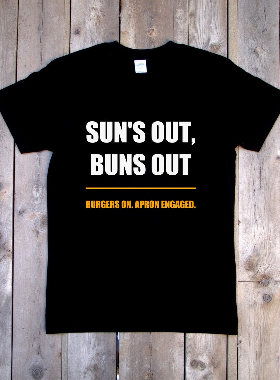 Sun's Out Buns Out Shirt — flat lay photo