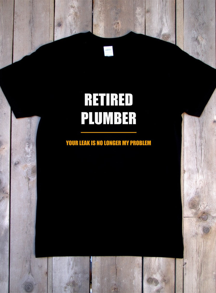 Retired Plumber Shirt — flat lay photo