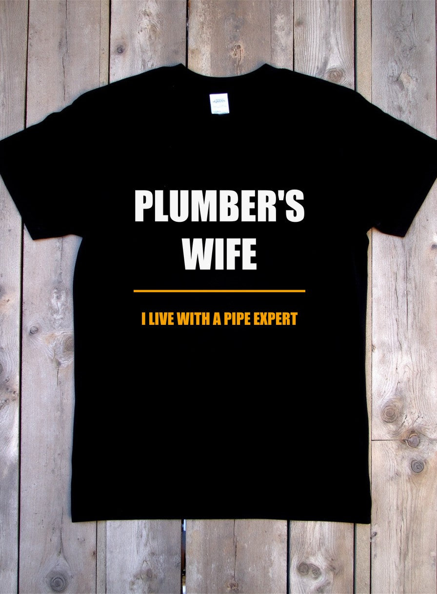 I Live With A Pipe Expert Plumber's Wife Shirt, Funny Tradesman Wife Gift — flat lay photo