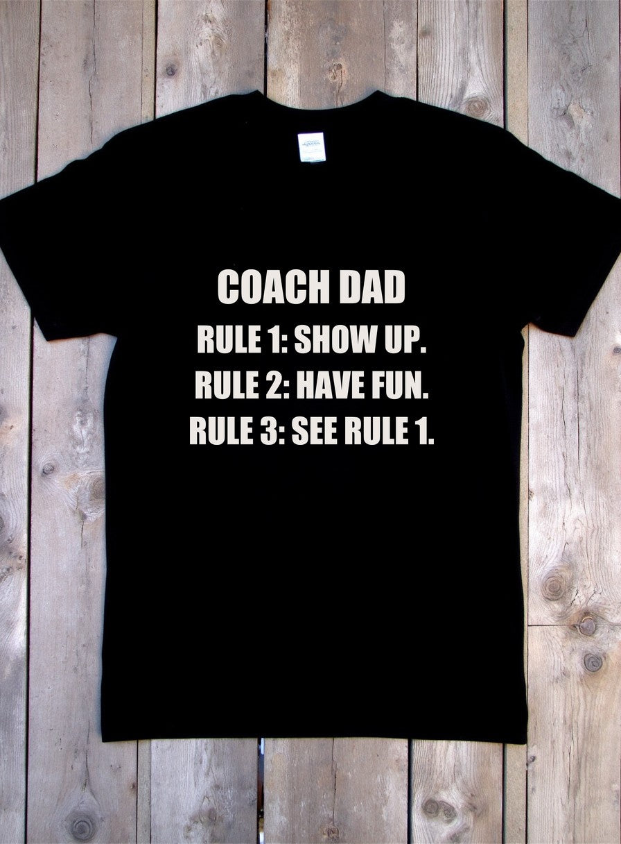 Coach Dad Soccer Shirt — flat lay photo