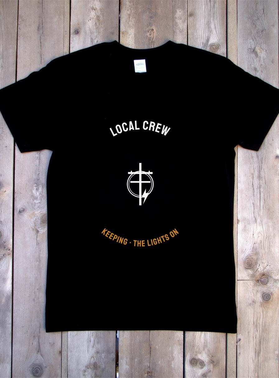 Keeping The Lights On Electrician Shirt — flat lay photo
