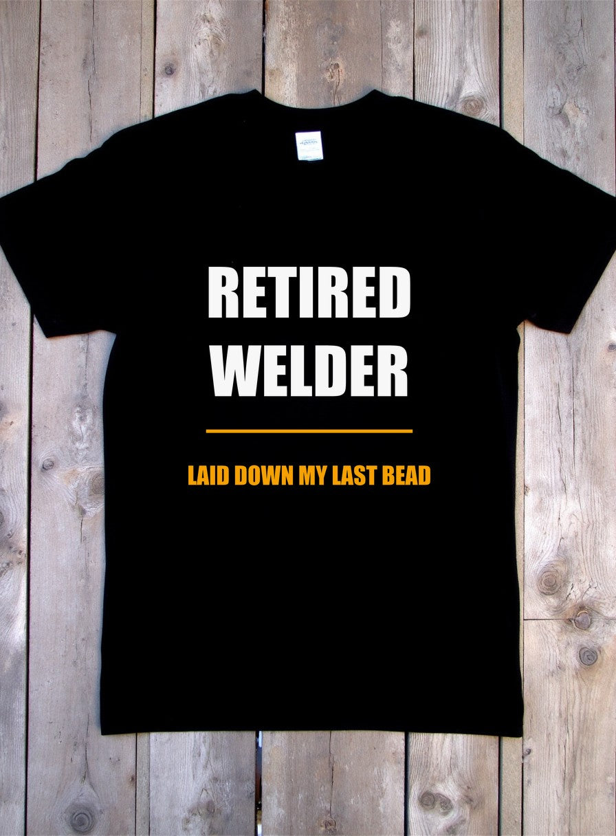Retired Welder Shirt — flat lay photo