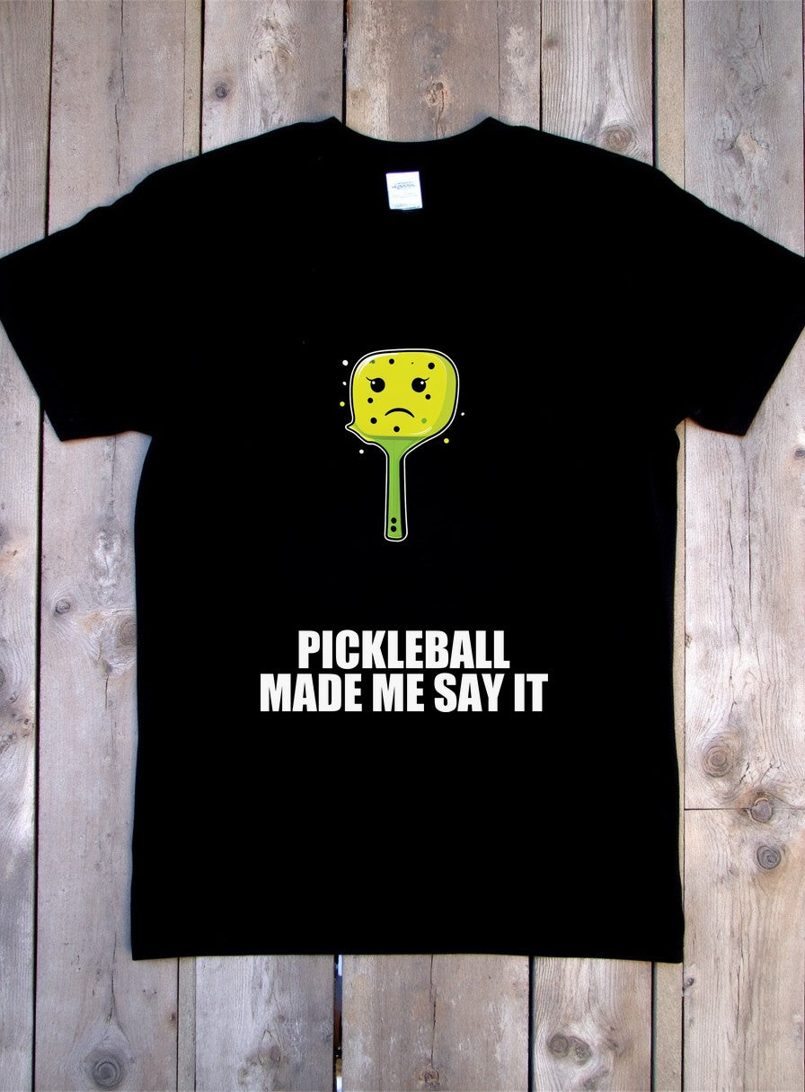 Pickleball Made Me Say It Shirt — flat lay photo
