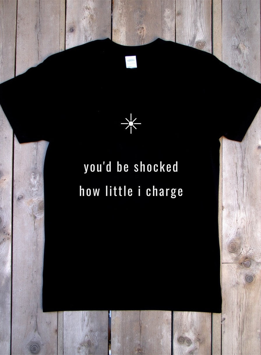 You'd Be Shocked How Little I Charge Shirt — flat lay photo