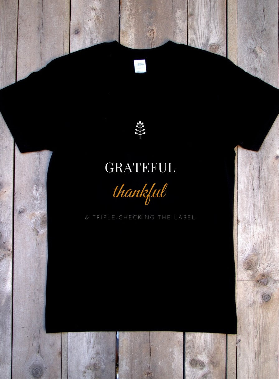 Grateful Thankful And Triple-Checking The Label Shirt — flat lay photo