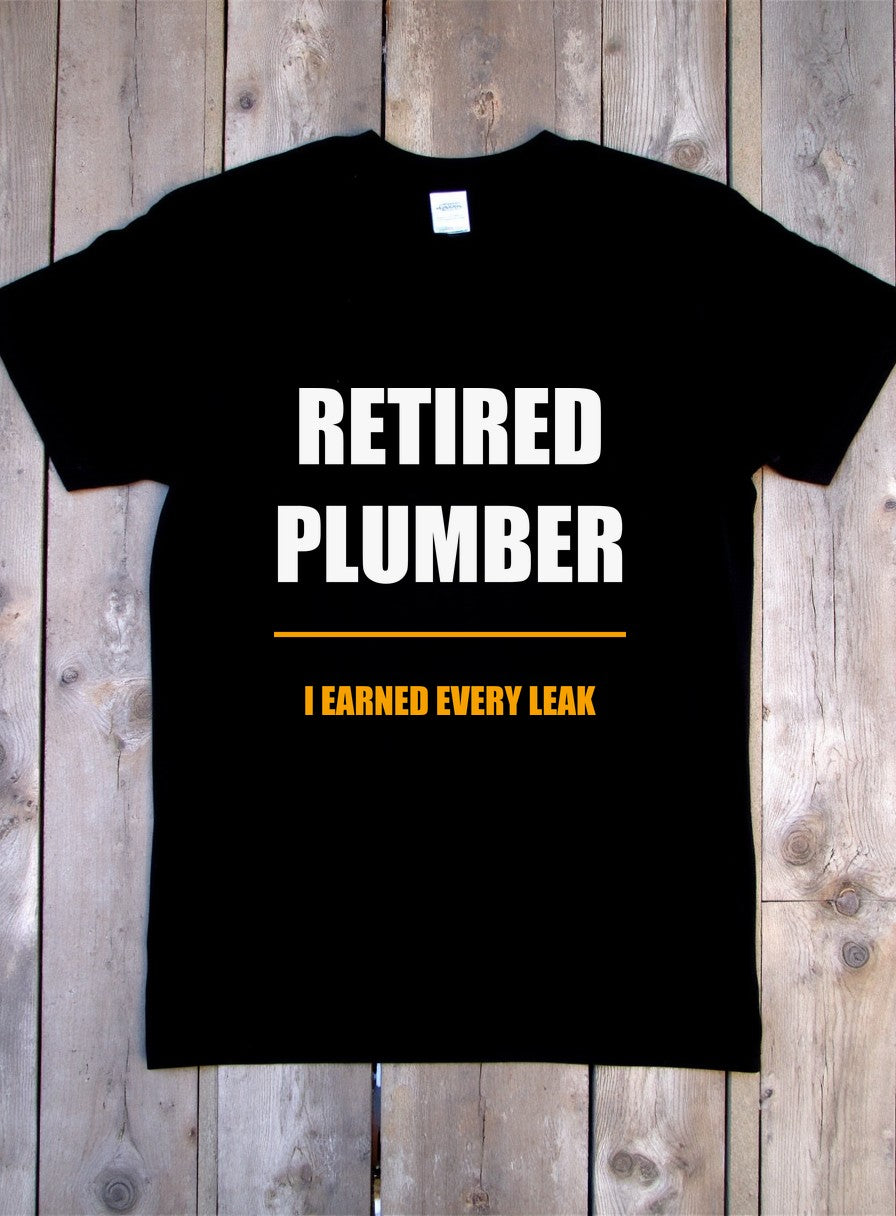 Retired Plumber Shirt, I Earned Every Leak, Father's Day Gift, Funny Tradesman Tee — flat lay photo