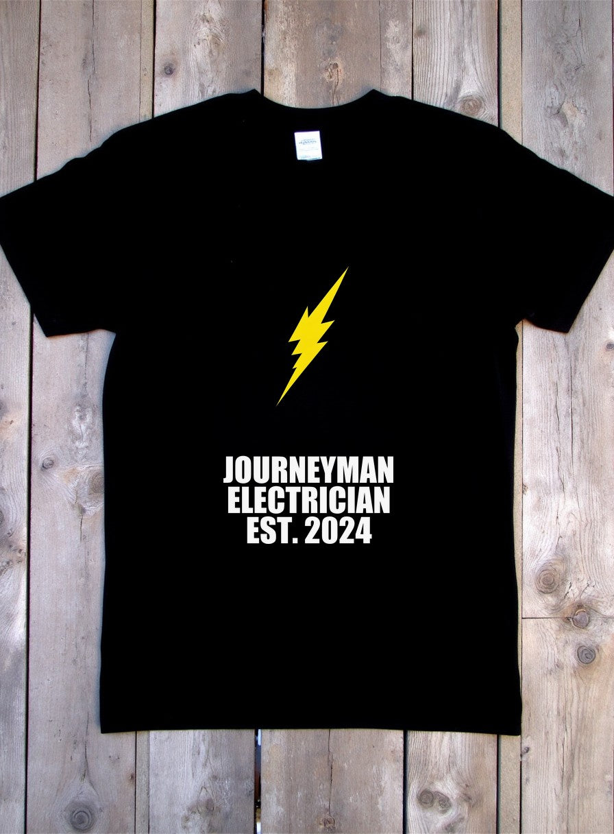 Journeyman Electrician Est 2024 Shirt — flat lay photo