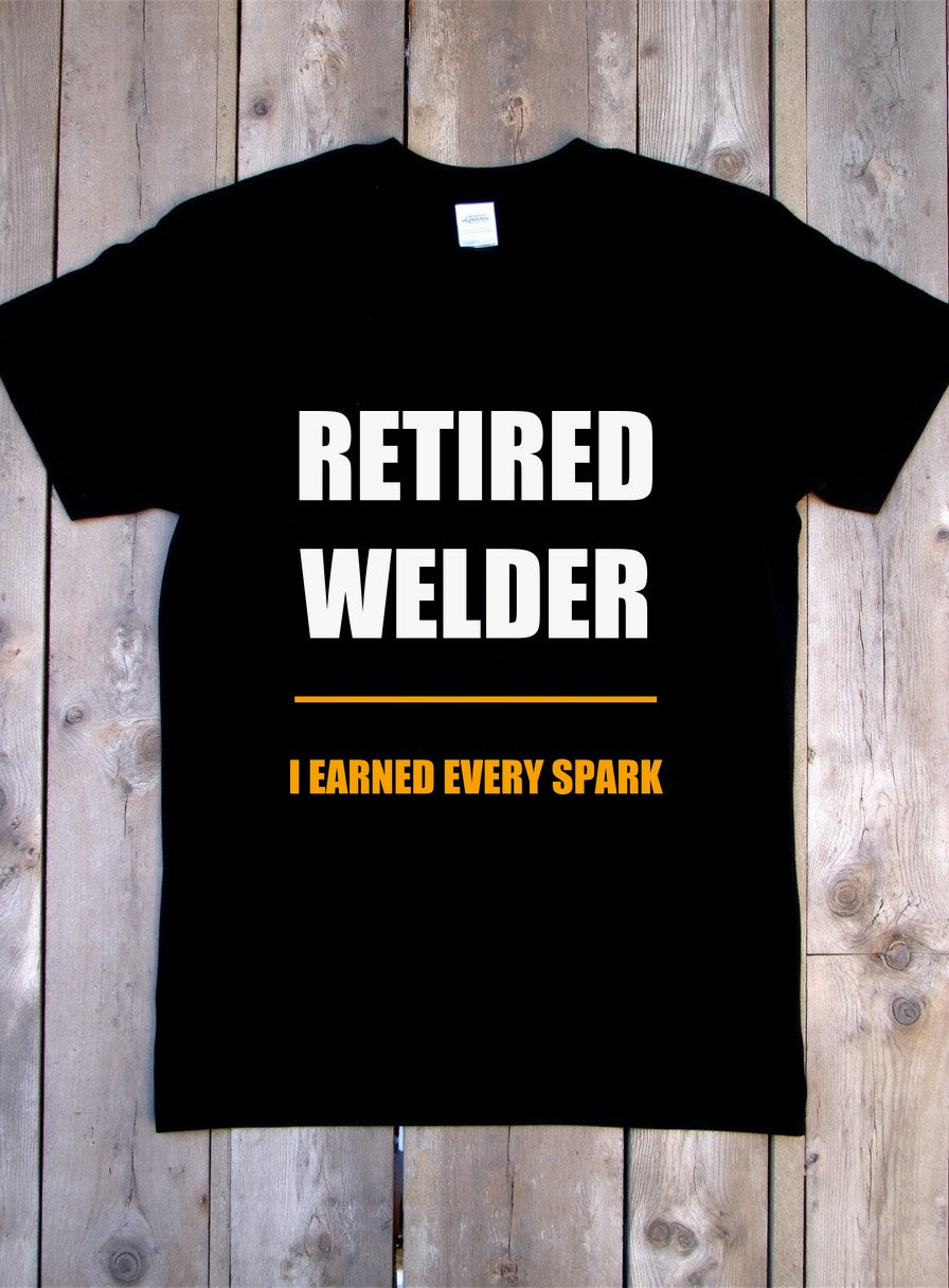 I Earned Every Spark Shirt, Retired Welder Father's Day Gift, Bella Canvas Tradesman Tee — flat lay photo